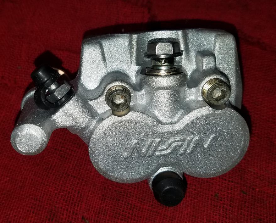 1992 kx125 front brake caliper.JPG