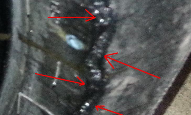 CHAIN LUBE ON TIRE.JPG