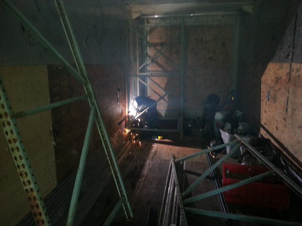 welding up some racks.JPG