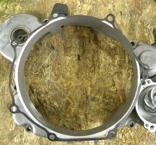KX450F GASKET LAID OVER A KX500 COVER.JPG