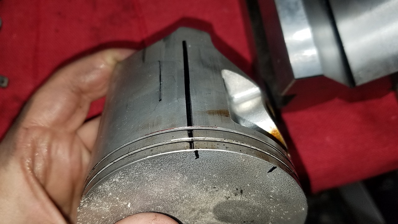 KX GURU RACING HOW TO ACCURATELY MARK YOUR PISTON OILING HOLE LOCATIONS 110.jpg